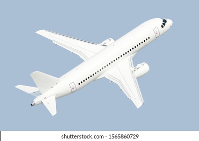 Modern Airplane With Aircraft Gear Up Isolated On Sky Color Background. Aerial Top Down View Of White Passenger Jet Plane In Air. Business Jet Airplane Silhouette For Design. Air Travel Transportation