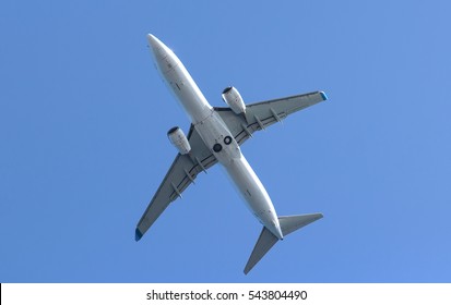 Modern Airplane At Takeoff Seen From The Bottom