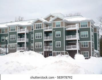 Modern Apartment Building After Winter Snow Storm