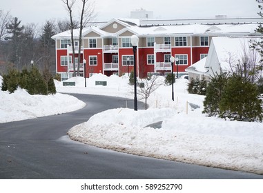 Modern Apartment Building After Winter Snow Storm