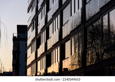 modern apartment building in the city on evening sky background