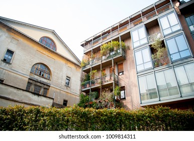 Modern Apartment Building Exterior And Old House In Sunny Day, Milano, Italy