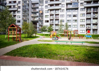 Modern apartment building with kids playground