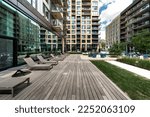 Modern apartment building in Montreal, Griffintown with amenities, city views, reception areas, patio and other common areas