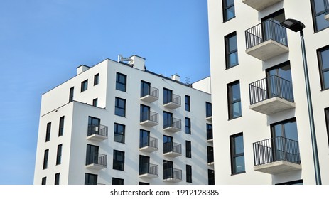 Modern apartment building in sunny day. Exterior, residential house facade. - Shutterstock ID 1912128385
