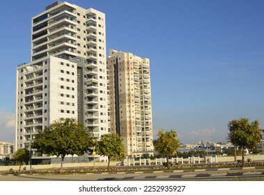 Modern apartment buildings, beautiful area. Orange garden from the window. Concept: real estate in Israel, investment, mortgage, credit. - Shutterstock ID 2252935927