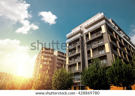 Modern apartment buildings exteriors in sunny day