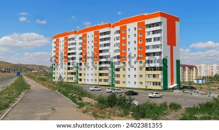 Modern apartment buildings. New residential area. Contemporary architecture. Bright. Blue Sky. Summer. Parking. Ust-Kamenogorsk (kazakhstan)