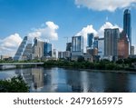 Modern apartment buildings and offices by the Colorado River in cityscape skyline of Austin Texas