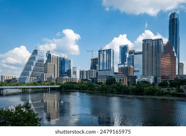 Modern apartment buildings and offices by the Colorado River in cityscape skyline of Austin Texas - Powered by Shutterstock