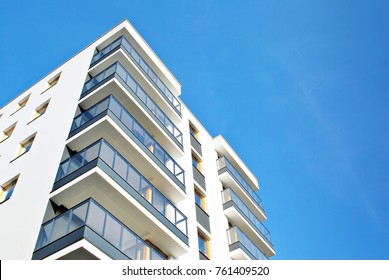 Modern apartment buildings on a sunny day with a blue sky. Facade of a modern apartment building - Shutterstock ID 761409520