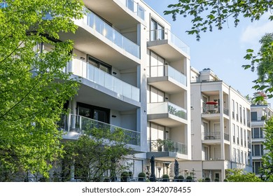 Modern apartment buildings surrounded by greens seen in Berlin, Germany