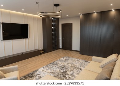 Modern apartment interior showcasing elegant design with stylish lighting and contemporary furnishings in a spacious living area - Powered by Shutterstock