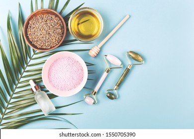 The Modern Apothecary Or Home Spa Composition. Selfcare, Relaxation And Beauty Items. Jade Rollers, Dry Lavender And Honey. Flatlay, Top View. Copy Space For Your Text.