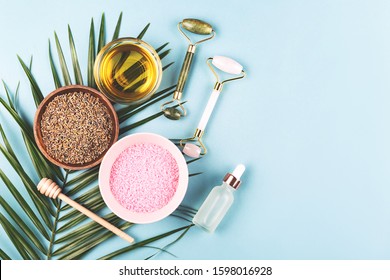 The Modern Apothecary Or Home Spa Composition. Selfcare, Relaxation And Beauty Items. Jade Rollers, Dry Lavender And Honey. Flatlay, Top View. Copy Space For Your Text.