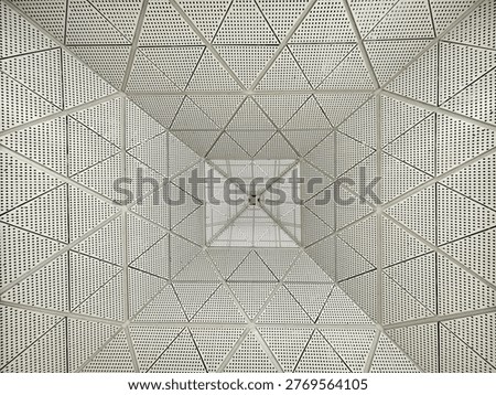 Modern architectural ceiling with geometric pattern and symmetry design inside building interior