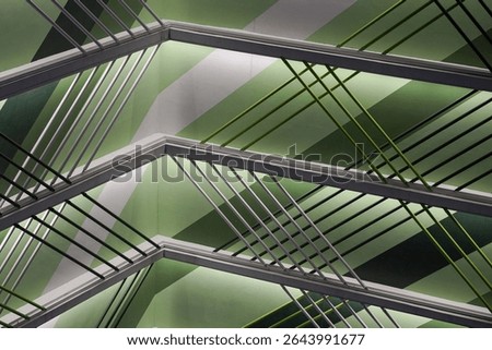 Modern architectural facade with geometric patterns, with abstract designs.