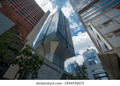 Modern Architectural Marvel: A Unique Skyscraper Against the City Skyline   - Powered by Shutterstock