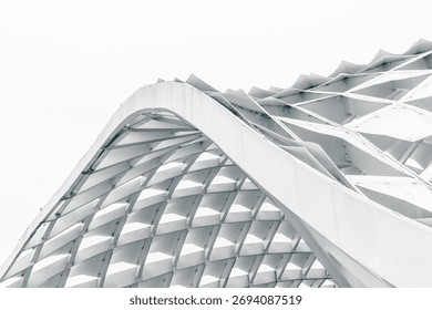 Modern architectural structure with geometric pattern and white background.