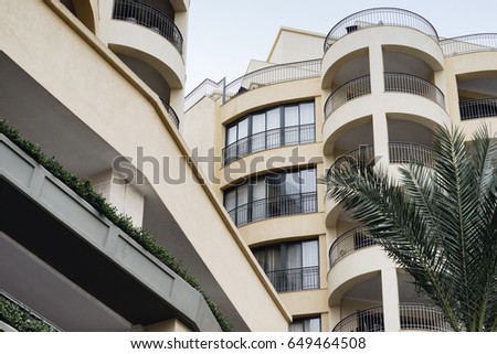 Modern architecture, balconies and windows on a contemporary building.