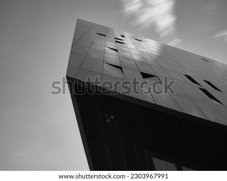 Modern architecture from below, black and white long exposure   