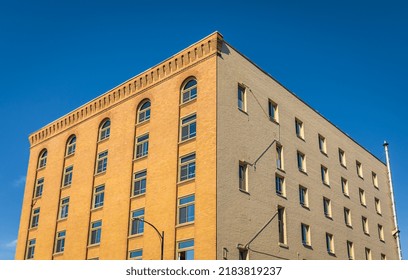 Modern Architecture Of Brick Building With Glass Windowos On Urban Street Of A Town. Facade Of Historical House In Victoria BC. Architecture Concept, Travel Photo, Nobody