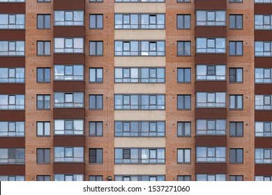 Modern Architecture Brick Facade High Rise Residential Building Front View.