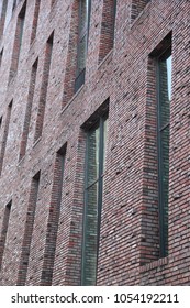 Modern Architecture. Brick Wall Facade Of Building