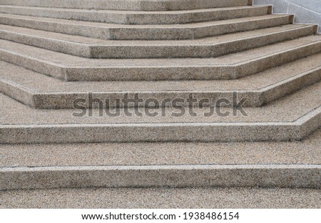 Modern architecture detail. Grunge texture of outdoor staircase. Step of rock stair with vintage style. 