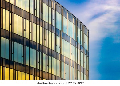 Modern Architecture Facade. Curtain Wall Facade Of Blue And Yellow.