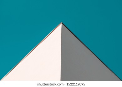 Modern Architecture Geometry against clear, blue sky. Minimalist Aesthetic. Abstract background with pyramidal shape. High Resolution Photography. - Shutterstock ID 1522119095