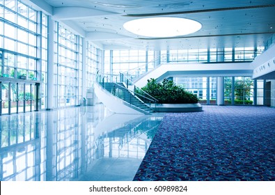 Modern Architecture Of Large Business Conference Center With Blue Tone.