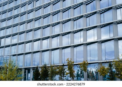 Modern Architecture, Long Curved Glass Wall Building Exterior.