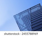 Modern architecture. Structural glazing of hi-tech ceiling. Minimal office building with glass and steel framework of roof or wall. Real estate, financial business and construction industry. Windows.