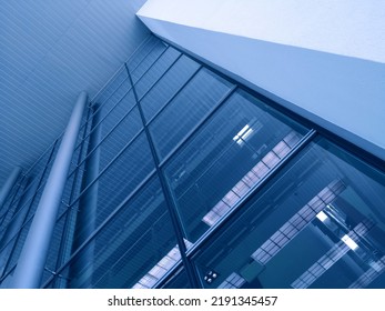 Modern Architecture. Structural Glazing Of Hi-tech Exterior. Minimal Office Building With Glass And Steel Wall View From Below. Real Estate, Financial Business And Construction Industry. Windows.