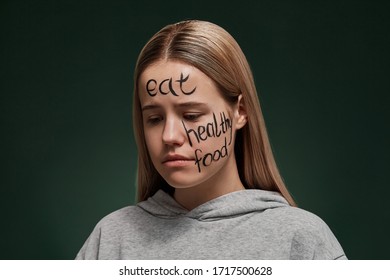 Modern Art Activity About Civilized Community Without Social Inequality And Bias. A Sad Blonde Lady With Long Straight Hair Is Labeled With A Stock Phrase Written On Her Face 