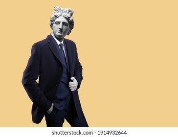 Modern Art Collage. Concept Portrait Fashion Man In Coat. Gypsum Head Of Apollo.