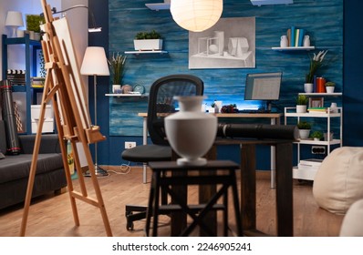 Modern art studio in person with artistic skills home. Empty contemporary visual drawing atelier with no artists creating artwork. Vase on table use to create color pencil masterpieces. - Powered by Shutterstock