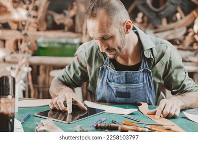 modern artist using tablet computer for helping design sale product and marketing contacts customer  - Powered by Shutterstock