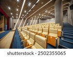 Modern Auditorium with Tiered Seating and Lighting