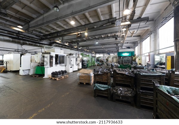 Modern automobile\
manufacturing plant. Factory with steel constructions. Industrial\
scenery background