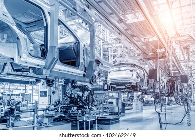 Modern automobile production line, automated production equipment. - Shutterstock ID 1024622449