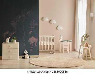 Modern Baby Room Dark Black Board Wall With Chalk, Wooden Cabinet And Cradle Background.