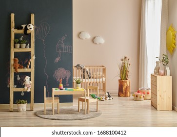 Modern Baby Room Dark Black Board Wall With Chalk, Wooden Cabinet And Cradle Background.