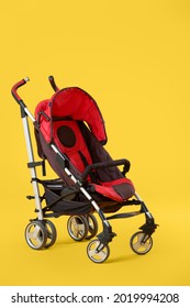 Modern Baby Stroller On Color Background