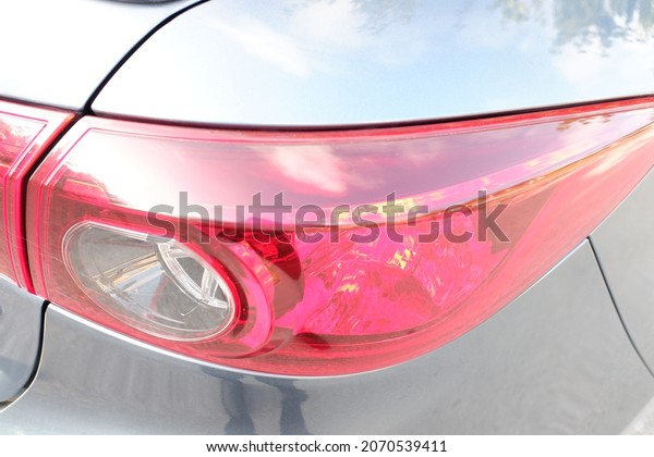 Modern backlights of the car.\
the headlight of modern prestigious car close-up. beautiful\
headlights of a car. direction indicators on a sports car. macro\
photo.