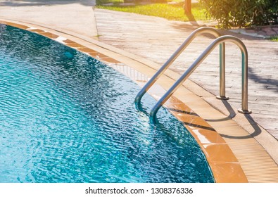 Modern Backyard Of A Swimming Pool In Public Resort Or Clubhouse
