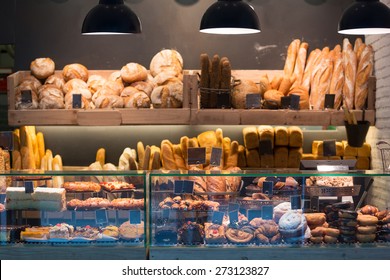 Modern bakery with different kinds of bread, cakes and buns   - Shutterstock ID 273123827