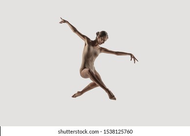 Modern Ballet Dancer. Contemporary Art Ballet. Young Flexible Athletic Woman.. Studio Shot Isolated On White Background. Negative Space.