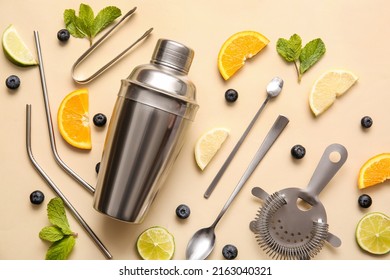 Modern Bartender Kit And Cocktail Ingredients On Color Background